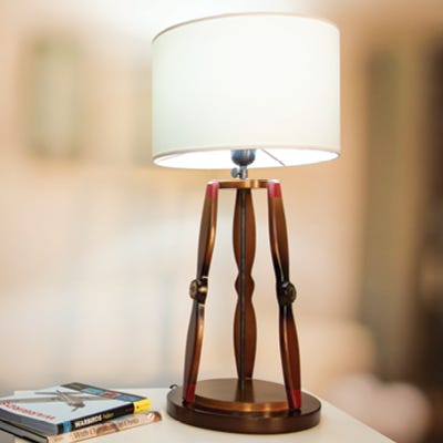 Vintage Mahogany Propeller Table Lamp with White Lampshade in home setting